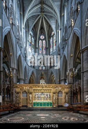 London, Westminster Abbey, the quire of the church with the Gothic Revival high altar by George Gilbert Scott and the Early English gothic vaulting Stock Photo