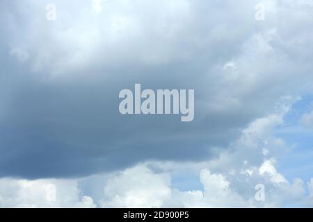 Scattered cloud clusters in a blue sky backgound. High resolution photo. Full depth of field. Stock Photo
