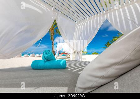 Serenity beach background, luxury beach canopy and travel or summer vacation concept. Design of tourism for summer vacation holiday destination Stock Photo