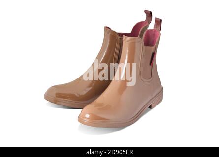 Female green rubber shoes for gardening on white isolated background Stock Photo