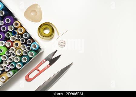 Set of sewing accessories on a white background with a copy space Stock Photo