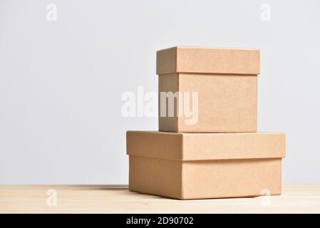 Gift boxes made of cardboard on gray background Stock Photo