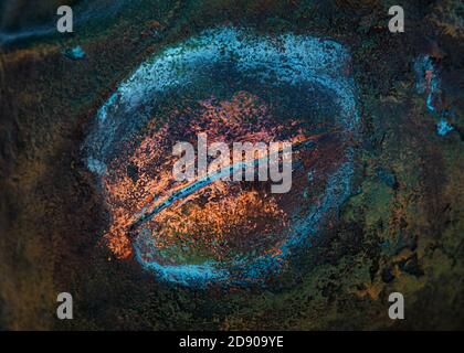 Multicolored rusty metal background. Iron background covered with rust and multicolored paint Stock Photo