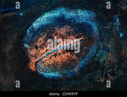 Multicolored rusty metal background. Iron background covered with rust and multicolored paint Stock Photo