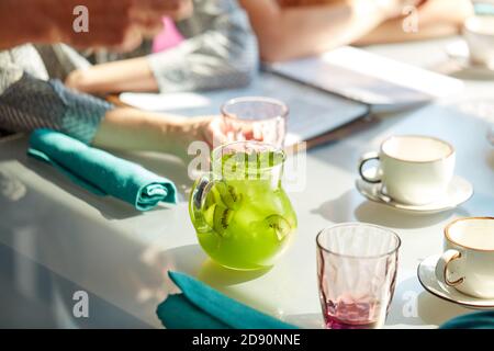 close-up photo of sweet delicious beverages on table in restaurant, kiwi juice for customers Stock Photo