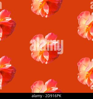 Seamless pattern with roses on a orange background. Pop art creative design for textile, fashion, wallpaper, fabric, wrapping paper. Stock Photo