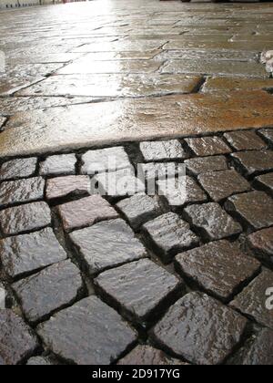 cobblestone texture of an ancient road of Milano after the rain Stock ...