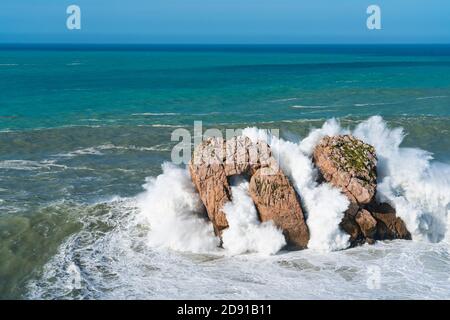 Swell in the Cantabrian Sea. Big waves in the so-called 'Puerta del Cantabrico' on the cliffs of Liencres. Municipality of Piélagos in the Autonomous Stock Photo