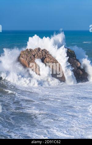 Swell in the Cantabrian Sea. Big waves in the so-called 'Puerta del Cantabrico' on the cliffs of Liencres. Municipality of Piélagos in the Autonomous Stock Photo