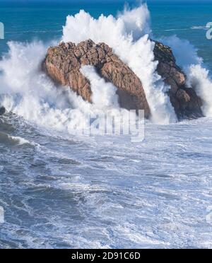 Swell in the Cantabrian Sea. Big waves in the so-called 'Puerta del Cantabrico' on the cliffs of Liencres. Municipality of Piélagos in the Autonomous Stock Photo