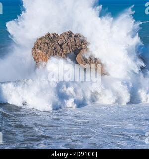 Swell in the Cantabrian Sea. Big waves in the so-called 'Puerta del Cantabrico' on the cliffs of Liencres. Municipality of Piélagos in the Autonomous Stock Photo