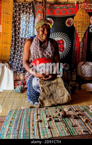 Sabi Sabi, South Africa - May 5, 2012: African Male Traditional Healer known as a Sangoma or witch-doctor performing a spiritual reading