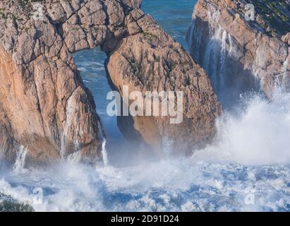 Swell in the Cantabrian Sea. Big waves in the so-called 'Puerta del Cantabrico' on the cliffs of Liencres. Municipality of Piélagos in the Autonomous Stock Photo