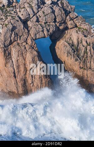 Swell in the Cantabrian Sea. Big waves in the so-called 'Puerta del Cantabrico' on the cliffs of Liencres. Municipality of Piélagos in the Autonomous Stock Photo