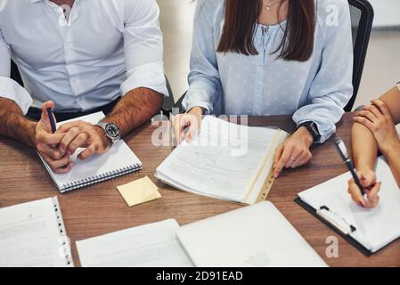 Close up view of business people that sitting and working together in the modern office Stock Photo