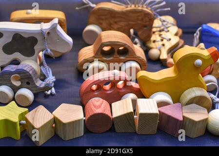 various wooden toys as a gift, eco-friendly and safe handmade products for children development and learning Stock Photo