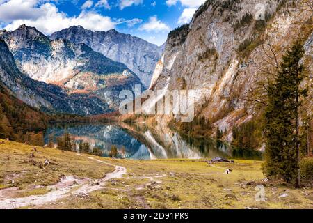Obersee with the famous east face of the Watzmann in the background in Berchtesgadener Land, Bavaria, Germany. Stock Photo