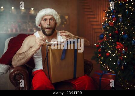 Bad Santa claus takes drugs, cocaine party, humor Stock Photo