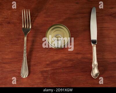 Different types of cans with prepared foods for consumption, vegetables, fish and meat Stock Photo