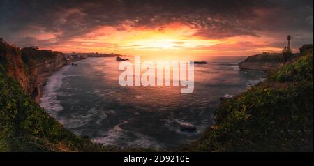 Sunset at Biarritz sea front at the Basque Country's coast. Stock Photo