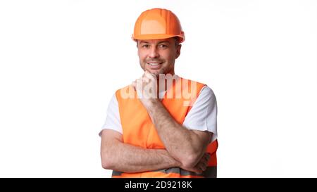 Builder Worker In Orange Uniform Posing Over White Background, Panorama Stock Photo