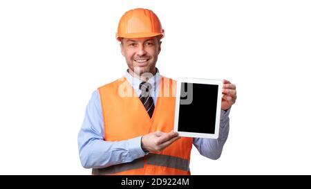 Construction Worker Showing Tablet Empty Screen Over White Background, Panorama Stock Photo