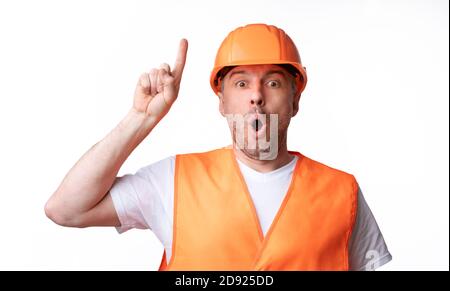 Builder Worker Pointing Finger Up Having Idea On White Background Stock Photo