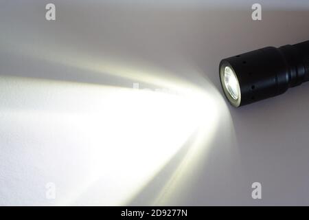 Maglite torch on white paper background Stock Photo