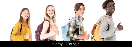 Panoramic shot of smiling multicultural teenagers showing like gesture isolated on white Stock Photo