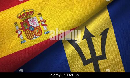 Spain and Barbados two flags textile cloth, fabric texture Stock Photo