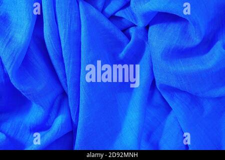 Crumpled blue fabric. Empty textile background, top view Stock Photo