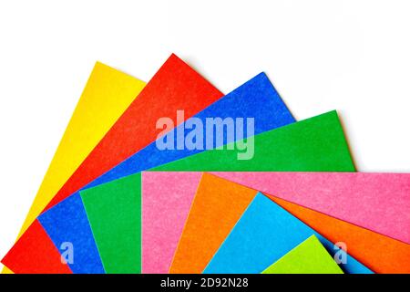 Top view of various colorful sheets of cardboard on a white background Stock Photo
