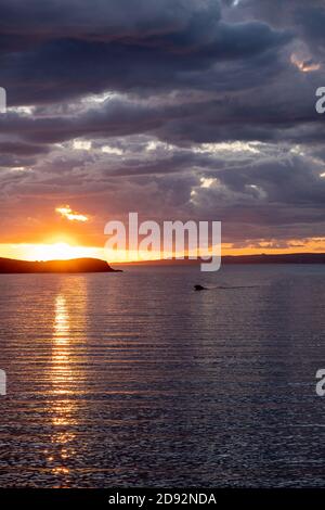 Mediterranean sea. Beautiful sunset and a lighthouse at Kea island, Greece.  Stock Photo by rawf8