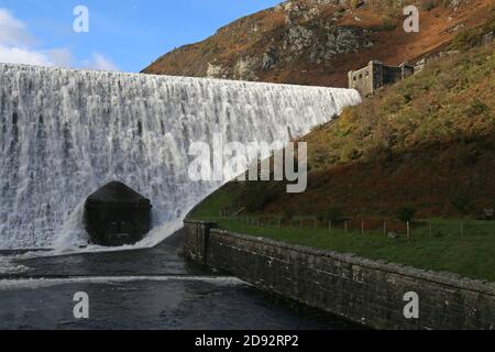 Caban Coch Dam in full overflow, Elan Valley, Rhayader, Radnorshire, Powys, Wales, Great Britain, United Kingdom, UK, Europe Stock Photo