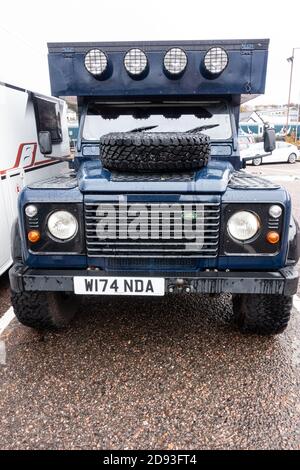 A Land Rover Defender converted into an overland expedition vehicle or camper, UK Stock Photo