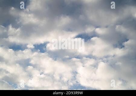 High resolution sky background image for use as sky replacement. Landscape orientation. White stratocumulus clouds on a blue sky Stock Photo