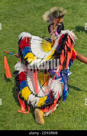 Native American boy wearing traditional clothing made of bird feather, Omak, Washington State, USA Stock Photo