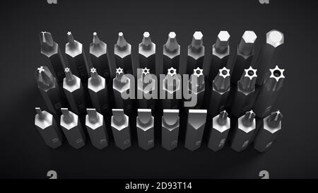 Different interchangeable screwdriver bits. Stock Photo