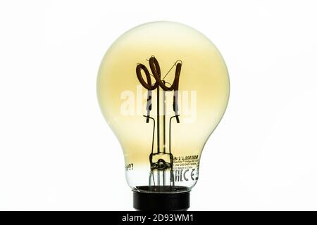 Sylvania ToLEDo retro filament style modern LED lamp for 240V circuits. Lamp is a modern take on the early loop filament designs Stock Photo