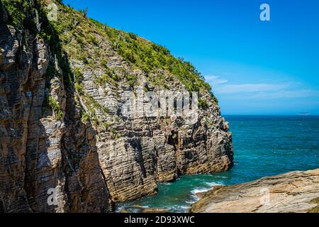 Beach in sunny summer day, on the sea of the Brazilian coast, in the region of the lakes, city of Cabo Frio, Rio de Janeiro, Brazil Stock Photo