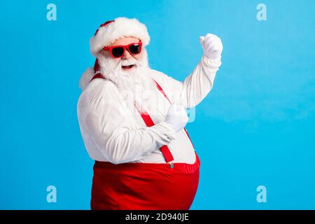 Photo of style stylish fat santa claus with big belly beard raise fists win x-mas christmas lottery wear suspenders overalls sunglass isolated over Stock Photo