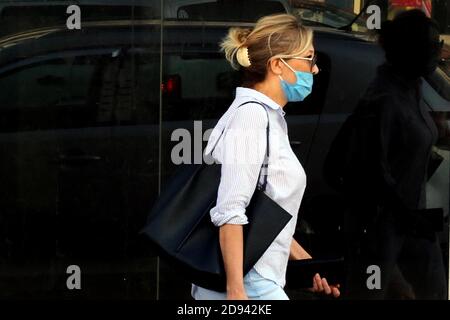 Amman, Jordan. 2nd Nov, 2020. A woman wearing a face mask walks on a street in Amman, capital of Jordan, on Nov. 2, 2020. Jordan on Monday recorded 5,877 new coronavirus cases, the highest daily spike in the country so far, raising the tally to 81,743. Credit: Mohammad Abu Ghosh/Xinhua/Alamy Live News Stock Photo