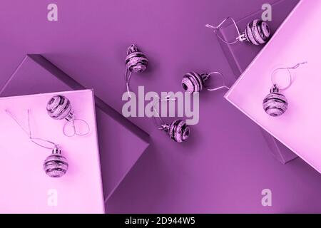 Monochromatic Christmas background, composition with gift boxes, christmas balls, decor.Top view. Flat lay Stock Photo