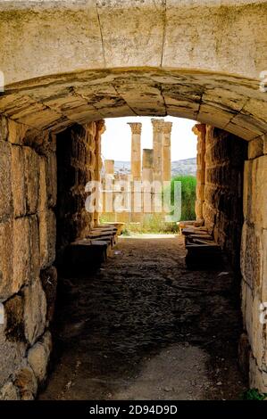 Tunnel at the back of the theater gives access to the upper rows of seats of the South Theater in Jerash Stock Photo