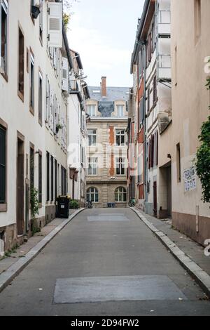 Strasbourg, France - Oct 18. 2020: Empty street in French street of Strasbourg with traditional Haussmannian buildings Stock Photo