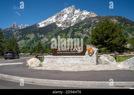 Grand Teton National Park, Wyoming - June 26, 2020: Sign for Jenny Lake, a famous scenic lake with a visitors center inside the National Park Stock Photo