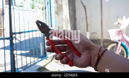 Close up of red pliers Stock Photo
