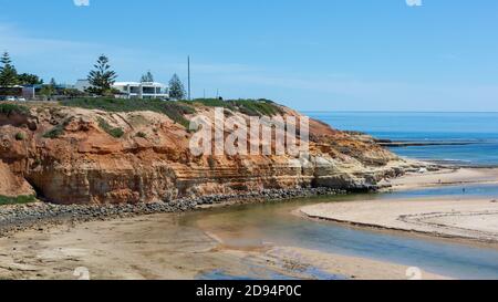 The iconic Southport cliffs and staircase at low tide located in Port Noarlunga South Australia on November 2 2020 Stock Photo