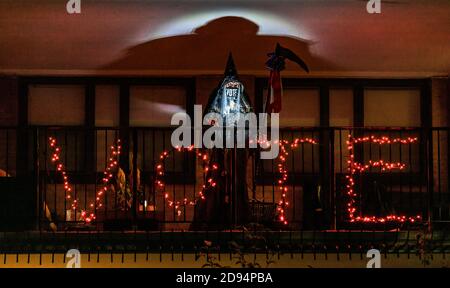 New York, USA. 2nd Nov, 2020. A Halloween skeleton figure wears a mask encouraging people to vote from a balcony in New York City's Upper East Side, on the eve of the US presidential election. Credit: Enrique Shore/Alamy Live News Stock Photo