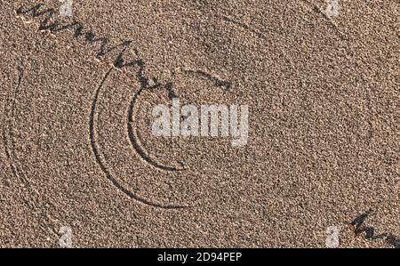 Natural concentric circle patterns in the sand Stock Photo